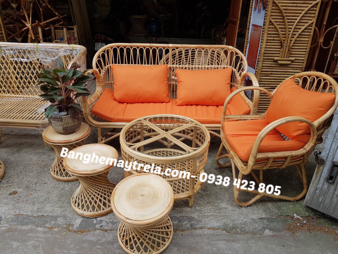 Bàn ghế mây tự nhiên tay cuộn phòng khách